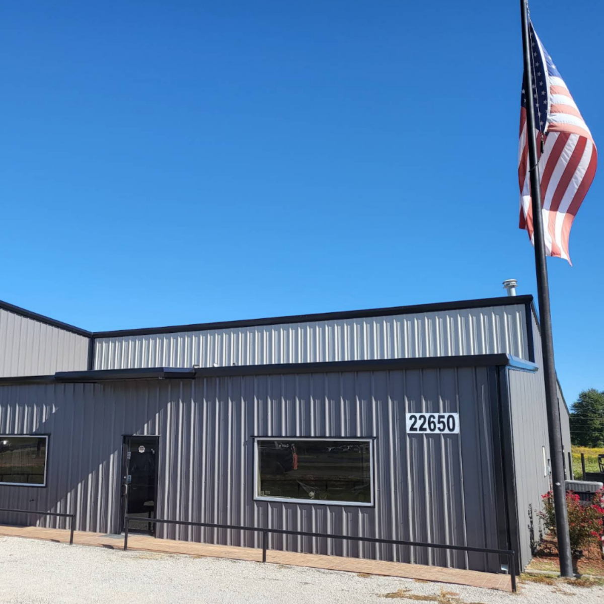 The Canton Carpets storefront on the I-20 frontage road in Wills Point, Texas